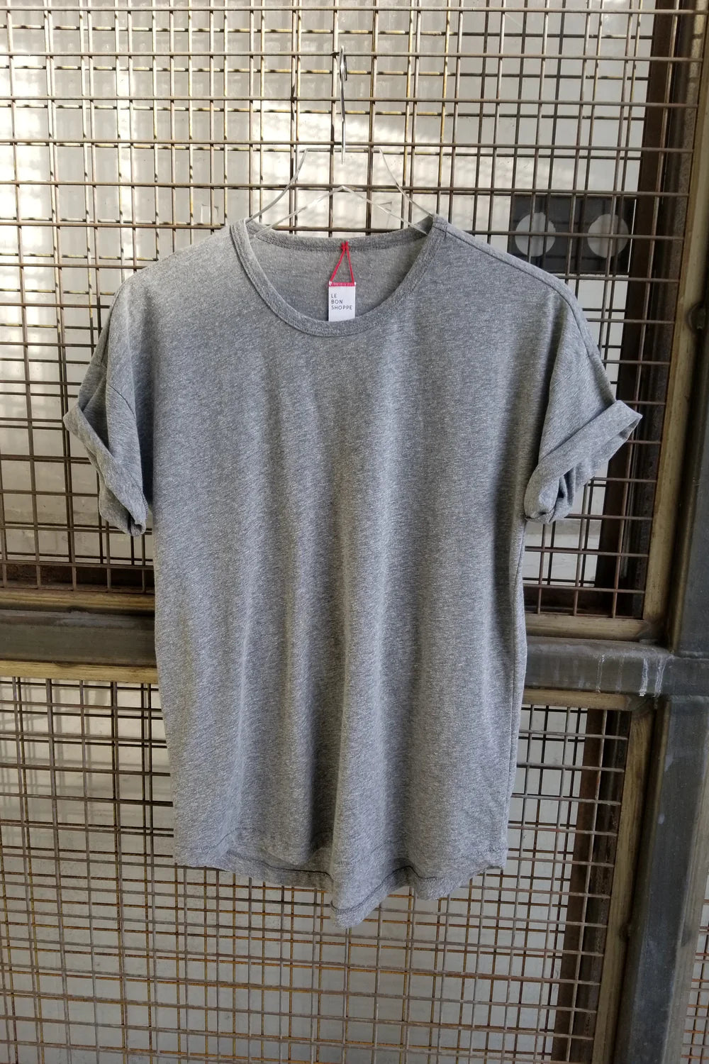 Her Tee